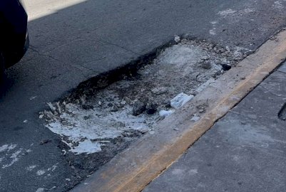 Denuncian peligroso bache en la calle Aldama