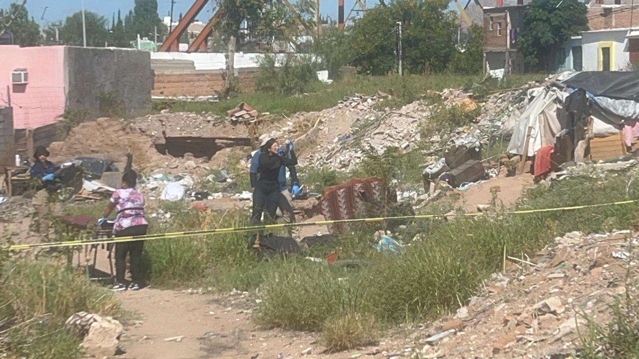 Localizan cadáver en baldío de la colonia Barrio Bajo