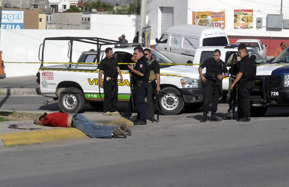 Traía una pistola fajada